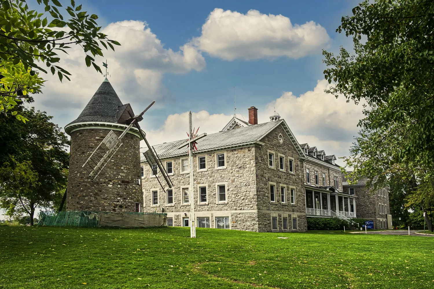 The stone windmill and the old convent on the point in Pointe-Claire Village