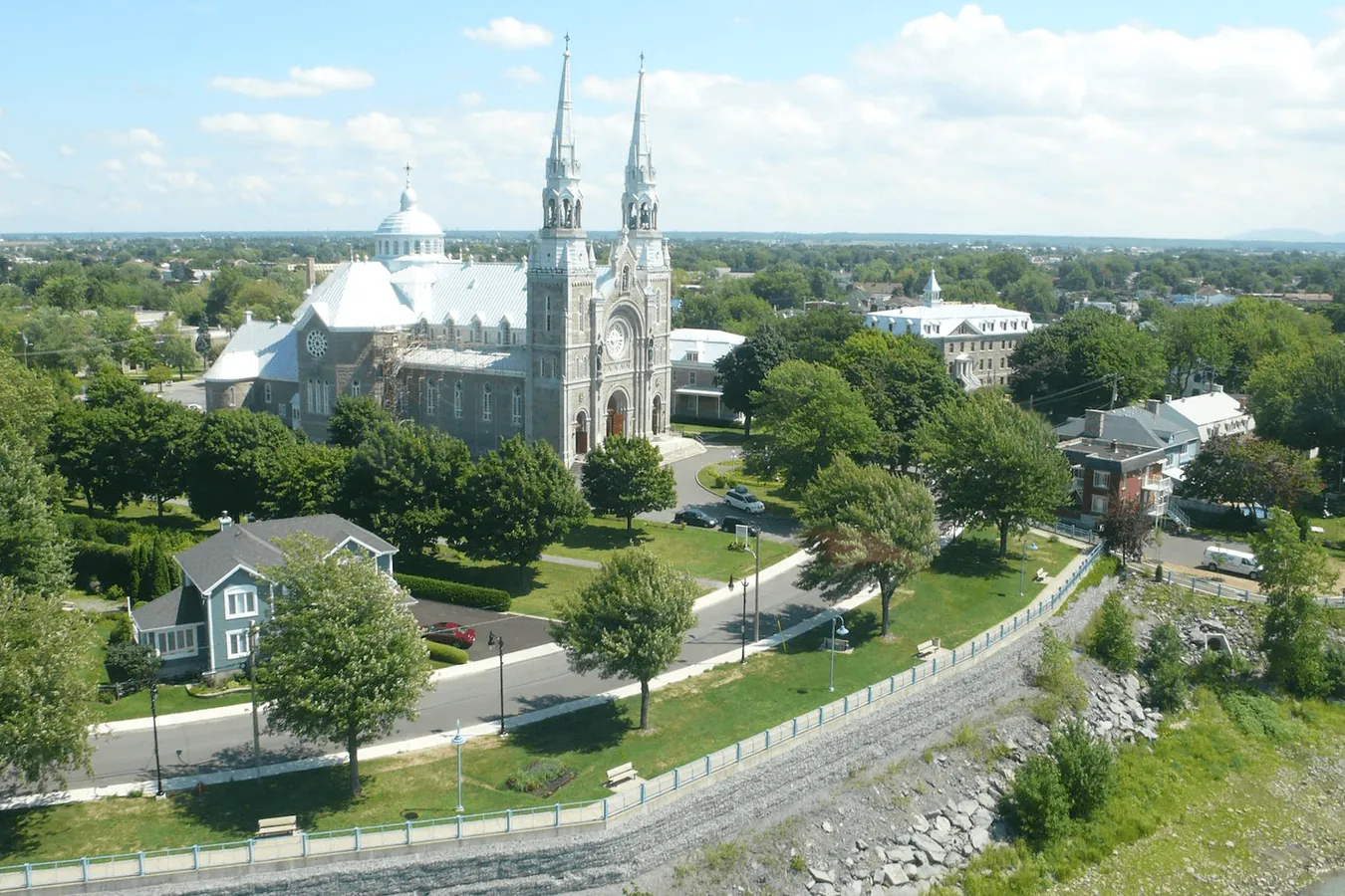 The Basilica of Sainte-Anne and its two bell towers above the St. Lawrence in Vieux-Varennes
