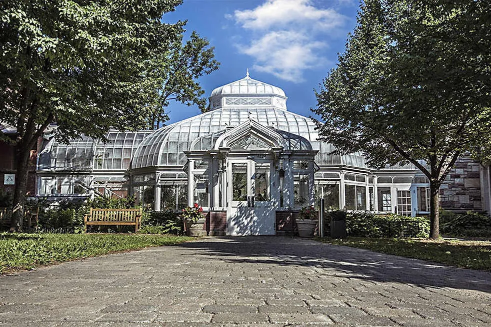 The glass conservatory beside the library in Westmount Park